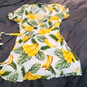 Tie across banana dress . Short